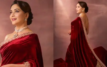 Madhuri Dixit Exudes Vintage Charm In A Wine Red Velvet Saree And Pearl Choker