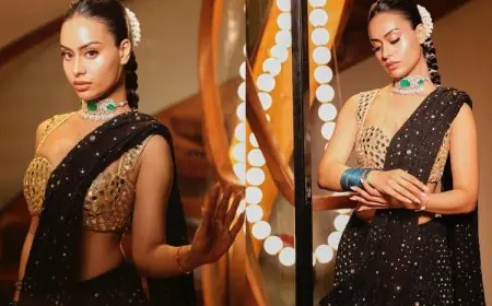 Nysa Devgan Channels Midnight Opulence In A Black Sequinned Saree And Gold Blouse