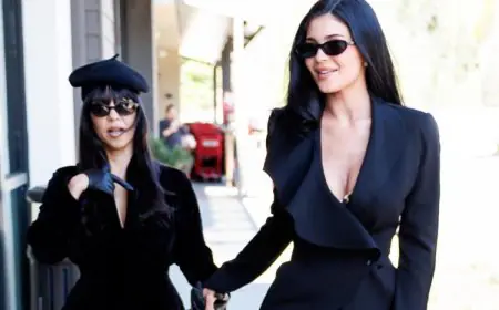 Kylie Jenner & Kourtney Kardashian Step Out In Matching All-Black Office Siren Looks